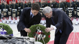 Harper and Trudeau just after election war memorial Cpl Cirillo.jpg